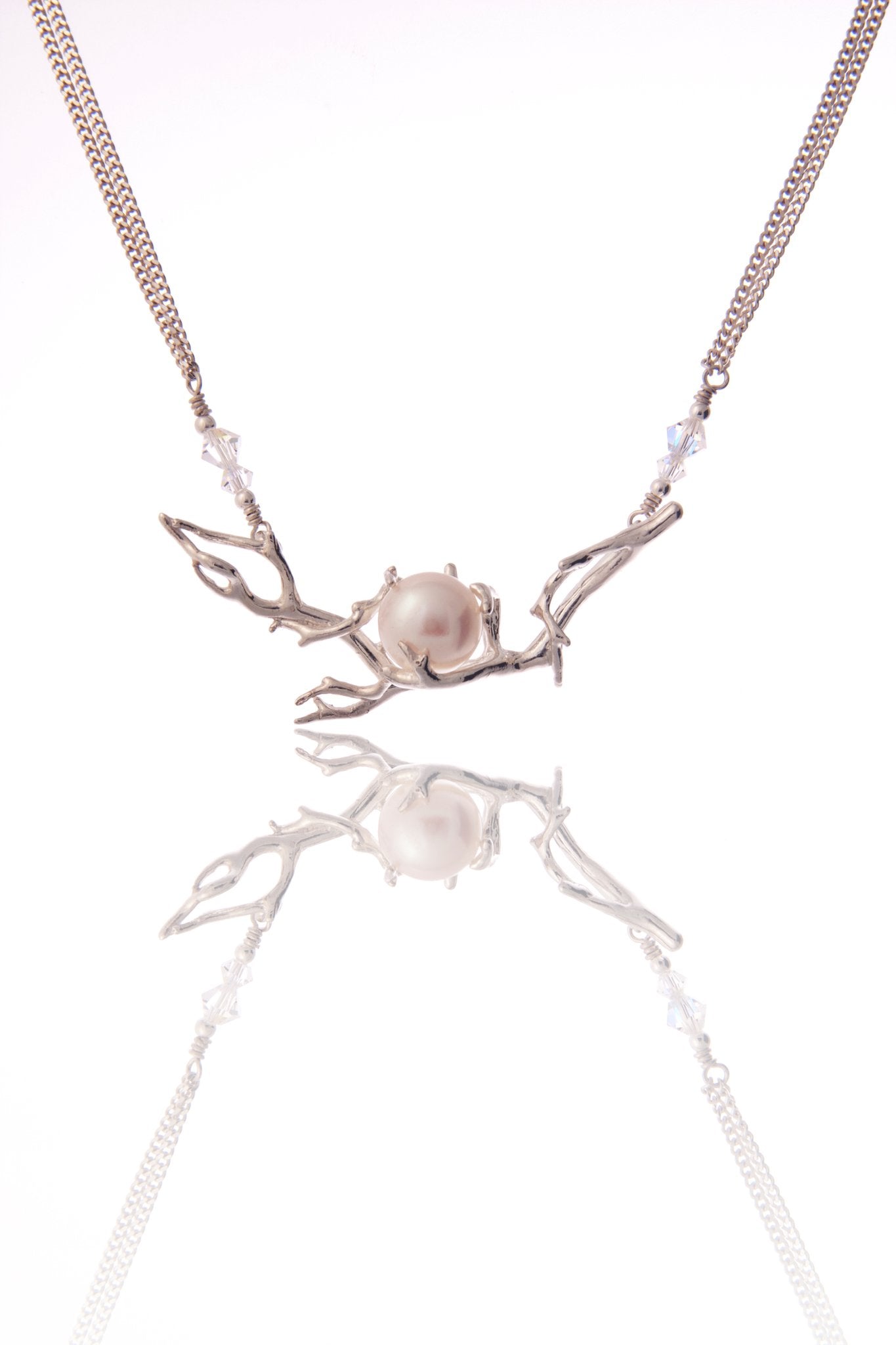 Collier Arabesque avec Perle Rose et fermoir cabillaud